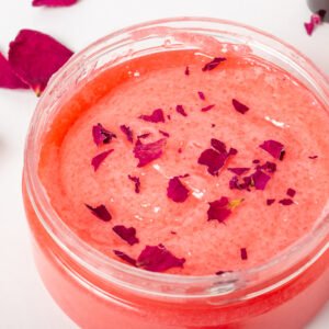 Jar of cosmetic body scrub with rose petals. Natural cosmetic. Home cosmetics